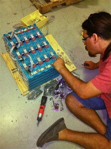 Building our battery bank - twenty cells bolted together in a 4x5 configuration.