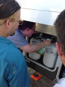 Assisting Pace with some RV maintenance. One of the realities of RVing.