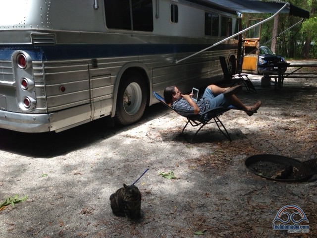 Chris attending iOS development classes. (Kiki helping.)