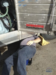 Even Scot gets dirty inspecting the transmission leak...