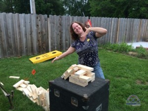 Playing giant Master Tech RV block balancing game.