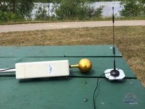 Ubiquiti NanoStation 2 on the left, and a magnetic-mount cellular antenna on the right.