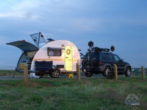 Our first home on wheels - 16' T@B Clamshell. No bathroom.. but we had solar!