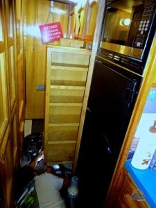 Repairing the pantry, with Kiki's supervision. 