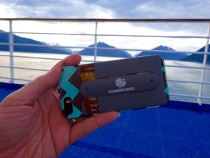 The stick on wallet with the stand closed. Super convenient for carry a cruise ship room card. 
