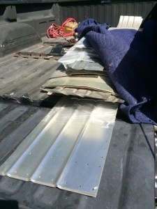A truck full of rare and alluring 50 year old never used before aluminum panels. 