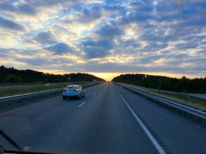 Driving into the sunset (bus on windshield and all!)