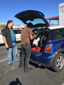 Test fitting two electric folding bikes into the back of our MINI. 