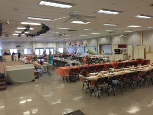 The multi-purpose clubhouse. Setting up for a shared Thanksgiving feast. 