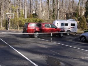 This invitation's directions included 'just park anywhere on the tennis court'. 
