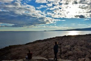 Chris and I watching the Holland America Veendam (the very ship we were on back in May) leave Bar Harbor. (Photo Credit: Howard Payne / RV-Dreams)