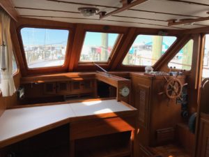 This 1984 Marine Trader had a classic look that felt dated on the interior, and the teak deck outside was in need of major work. 