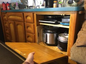 Storage cabinet where our old stove & oven used to be. 