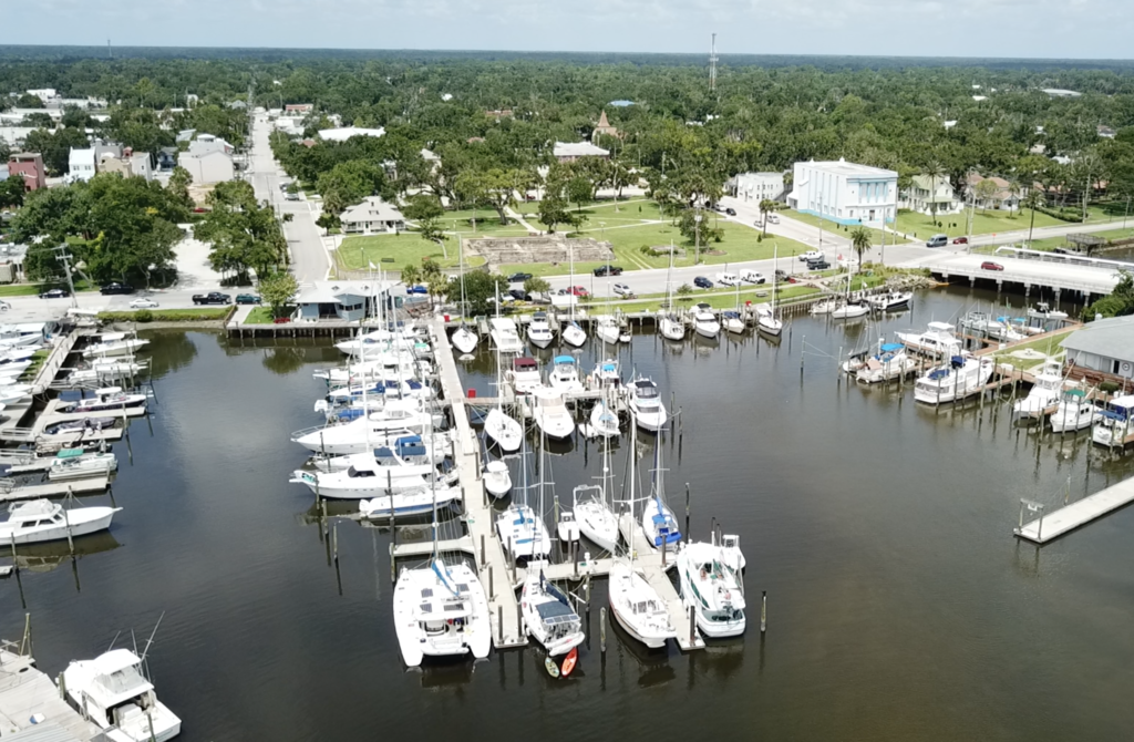 We always give the dock master our actual length, to make sure we get a slip appropriate for our boat. 